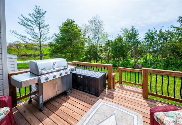 1004 Kodiak Ct, Wentzville, MO 63385 - wooden deck featuring area for grilling and view of scattered trees