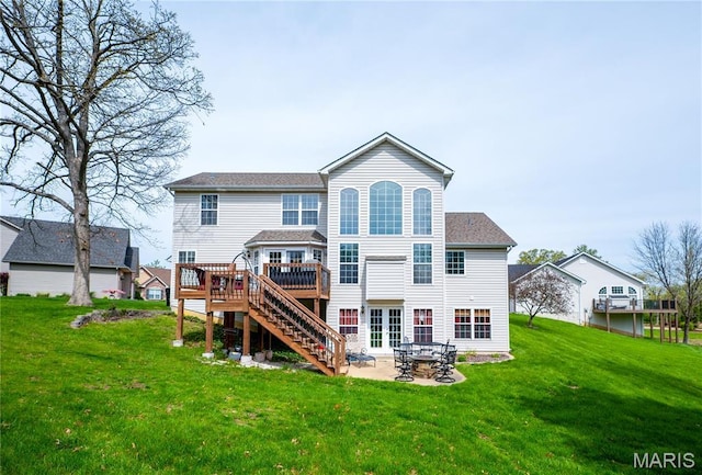 1004 Kodiak Ct, Wentzville, MO 63385 - rear view of property with a yard, a wooden deck, a patio area, and stairs
