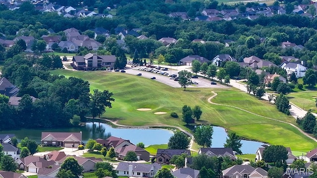 1004 Kodiak Ct, Wentzville, MO 63385 - aerial perspective of suburban area featuring a large body of water and a golf course