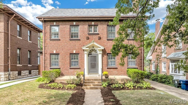 9 Aberdeen Pl, Saint Louis, MO 63105 - view of front of house with brick siding