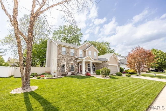 1237 Conrad Ln, Ofallon, IL 62269 - view of front facade with an attached garage, brick siding, driveway, and a chimney
