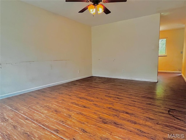 13556 Rustic Valley Dr, Wright City, MO 63390 - spare room with ceiling fan, wood finished floors, and baseboards