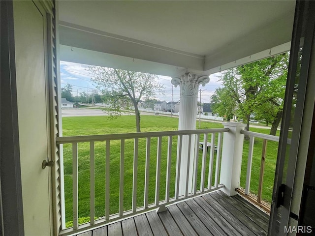 3114 Edwards Pl Unit 304, Maryland Heights, MO 63043 - deck with covered porch and a yard