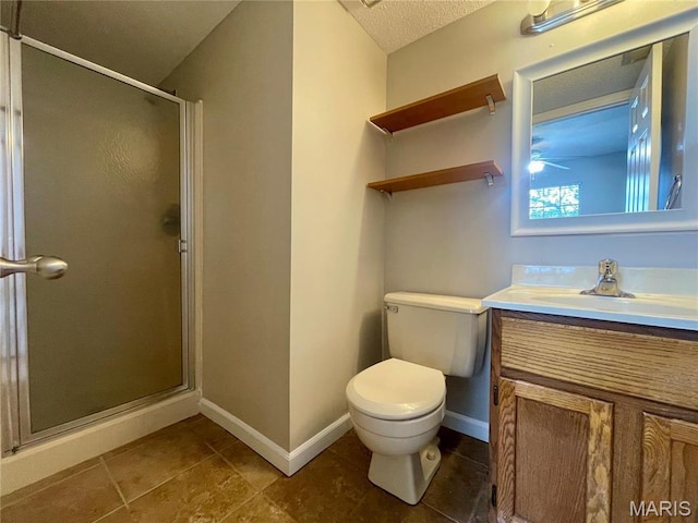 3114 Edwards Pl Unit 304, Maryland Heights, MO 63043 - full bathroom featuring a stall shower, toilet, vanity, baseboards, and tile patterned flooring