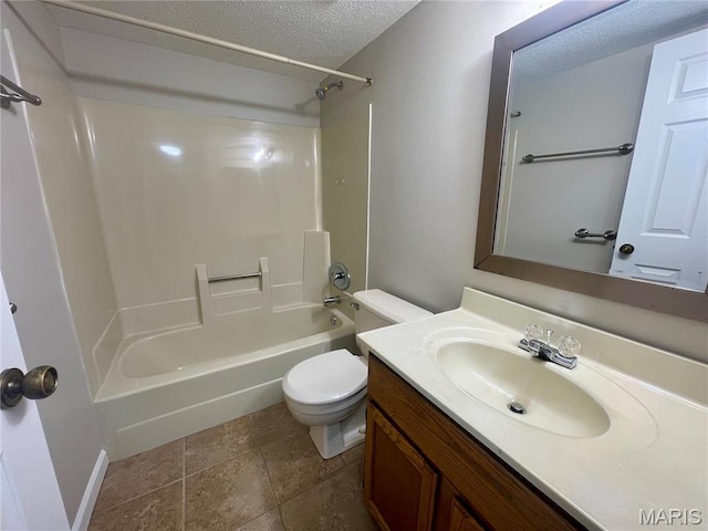 3114 Edwards Pl Unit 304, Maryland Heights, MO 63043 - bathroom featuring a textured ceiling, toilet, tub / shower combination, vanity, and baseboards