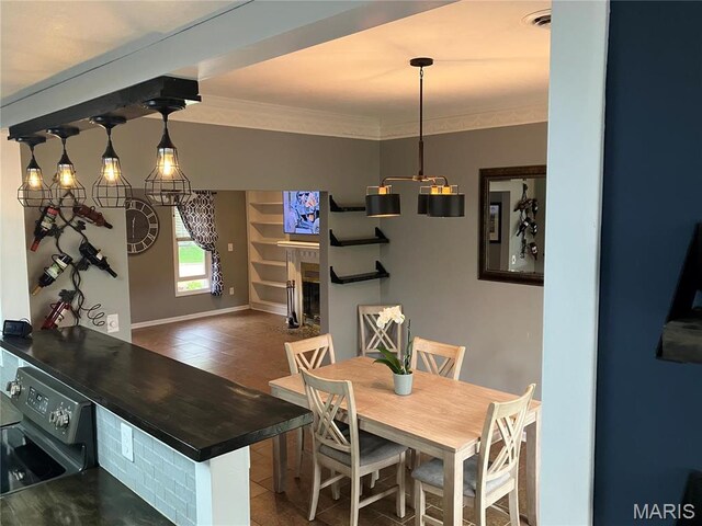 303 Greenbriar, Rolla, MO 65401 - dining area with crown molding and baseboards