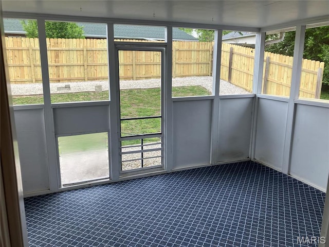 303 Greenbriar, Rolla, MO 65401 - unfurnished sunroom with healthy amount of natural light