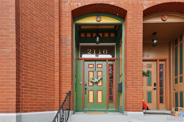 2116 Victor St, Saint Louis, MO 63104 - doorway to property featuring brick siding