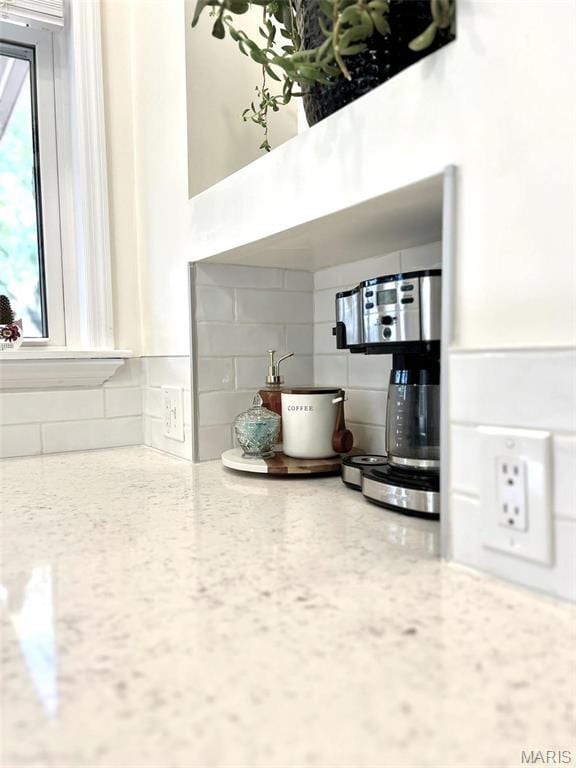 2116 Victor St, Saint Louis, MO 63104 - kitchen view of tasteful backsplash and light stone counters