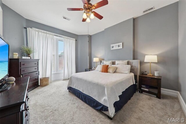 2116 Victor St, Saint Louis, MO 63104 - carpeted bedroom with a ceiling fan and baseboards