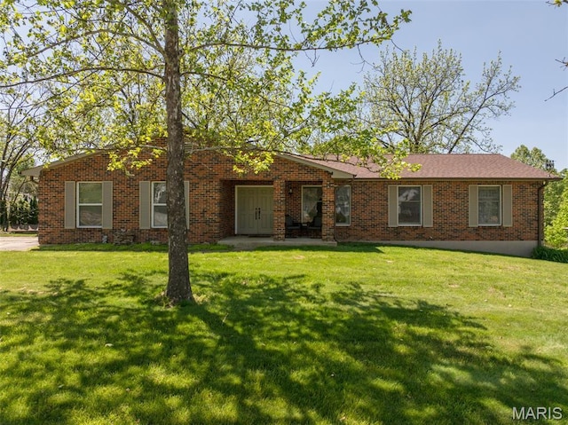 6344 Gibison Rd, Troy, MO 63379 - single story home with a front yard and brick siding
