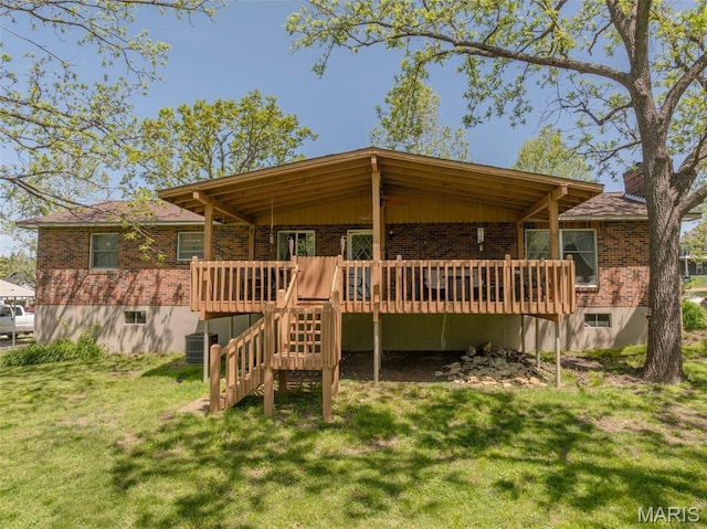 6344 Gibison Rd, Troy, MO 63379 - rear view of property with brick siding, a wooden deck, a lawn, and stairway