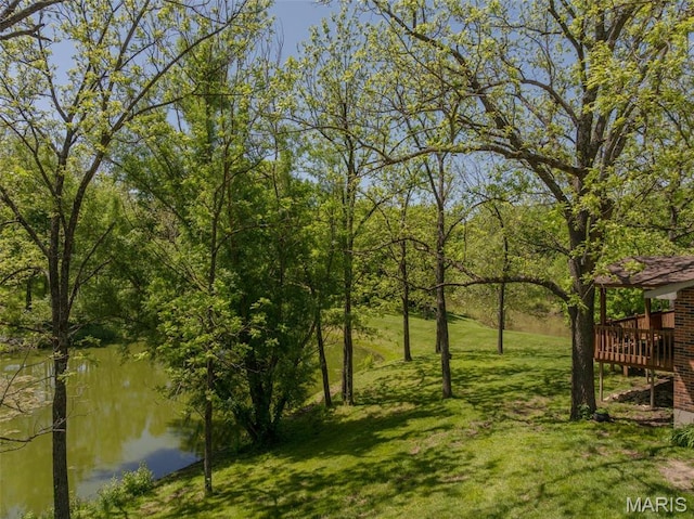 6344 Gibison Rd, Troy, MO 63379 - view of green lawn with a deck with water view