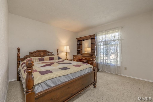 6344 Gibison Rd, Troy, MO 63379 - bedroom with light carpet and baseboards