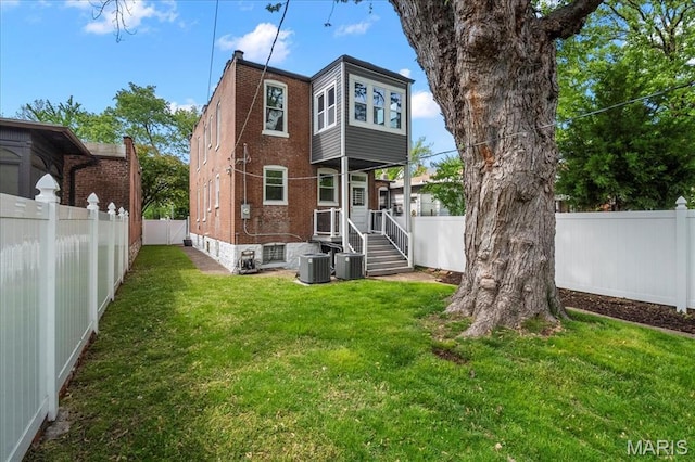5518 Alaska Ave, Saint Louis, MO 63111 - back of property with brick siding and central AC unit