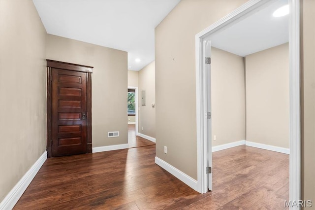 5518 Alaska Ave, Saint Louis, MO 63111 - entryway with wood finished floors, baseboards, and recessed lighting