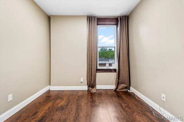 5518 Alaska Ave, Saint Louis, MO 63111 - empty room featuring wood finished floors and baseboards