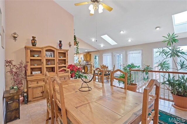 5026 Kype View Ave, Festus, MO 63028 - dining room featuring a skylight, light tile patterned floors, ceiling fan, recessed lighting, and high vaulted ceiling