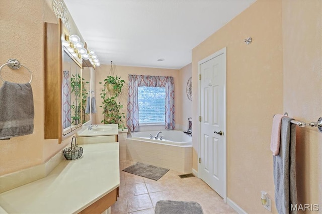 5026 Kype View Ave, Festus, MO 63028 - full bath with a garden tub, vanity, and tile patterned flooring