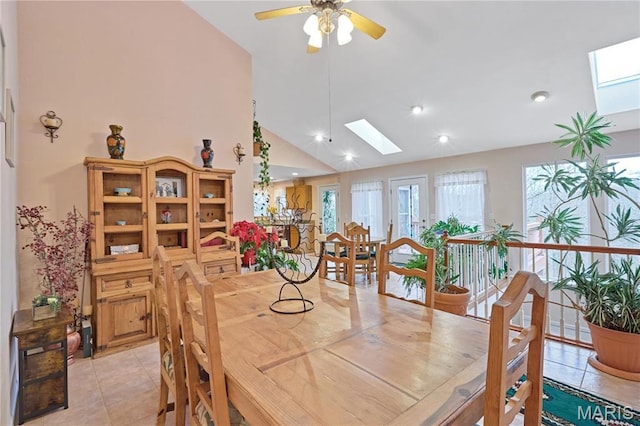 5026 Kype View Ave, Festus, MO 63028 - dining space featuring a skylight, light tile patterned flooring, ceiling fan, recessed lighting, and high vaulted ceiling