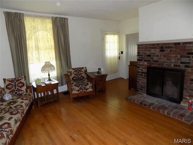 525 Russellville Rd, Arcadia, MO 63621 - living area featuring light wood finished floors and a fireplace