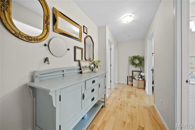 3066 W Meyer Rd, Foristell, MO 63348 - hall featuring light wood-style flooring and baseboards