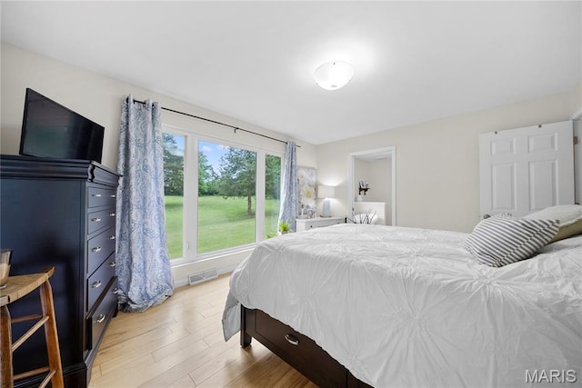 3066 W Meyer Rd, Foristell, MO 63348 - bedroom featuring light wood-style flooring