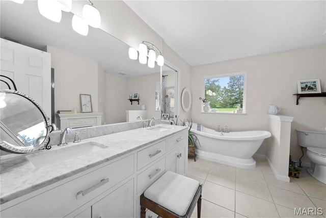 3066 W Meyer Rd, Foristell, MO 63348 - full bath featuring a freestanding bath, tile patterned floors, and double vanity