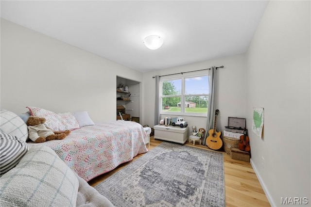 3066 W Meyer Rd, Foristell, MO 63348 - bedroom with wood finished floors and baseboards