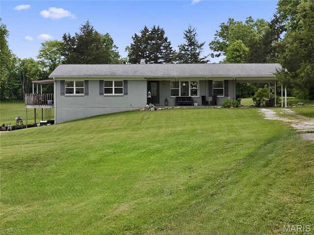 3066 W Meyer Rd, Foristell, MO 63348 - view of front of home featuring a front yard, a porch, dirt driveway, an attached carport, and brick siding