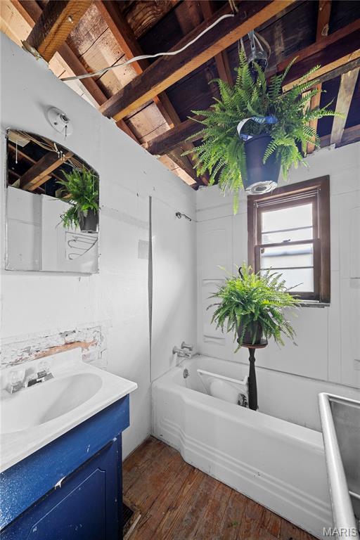 3066 W Meyer Rd, Foristell, MO 63348 - full bathroom featuring vanity and wood-type flooring