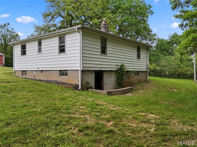 3066 W Meyer Rd, Foristell, MO 63348 - view of side of property with a yard and a chimney