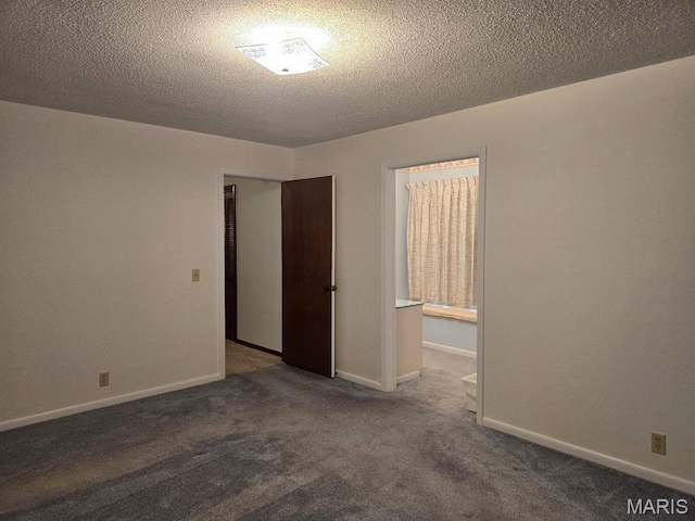 16043 County Road 624, Dexter, MO 63841 - carpeted spare room with a textured ceiling and baseboards