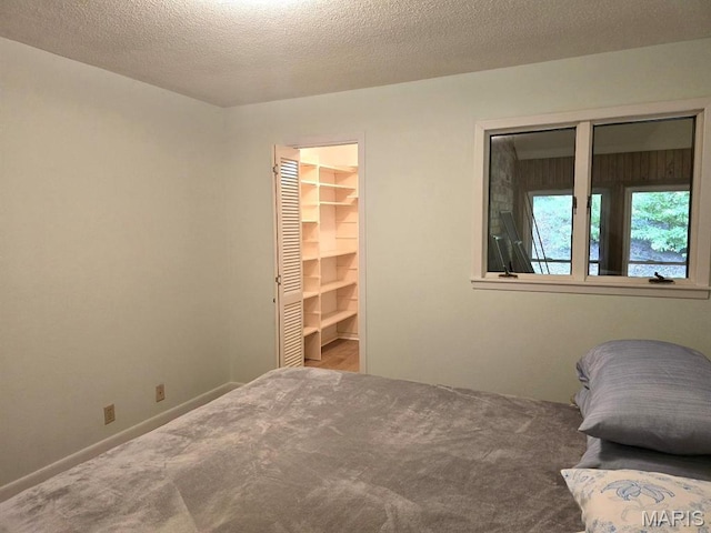 16043 County Road 624, Dexter, MO 63841 - bedroom with carpet and a textured ceiling