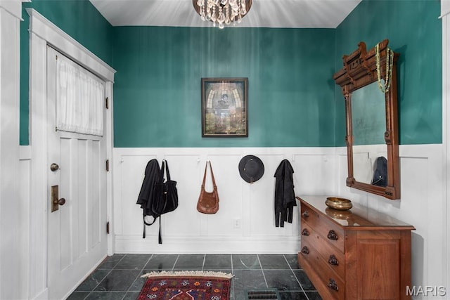 2056 Lafayette Ave Unit 1W, Saint Louis, MO 63104 - mudroom featuring wainscoting, a chandelier, and a decorative wall