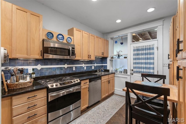 2056 Lafayette Ave Unit 1W, Saint Louis, MO 63104 - kitchen featuring appliances with stainless steel finishes, light brown cabinetry, tasteful backsplash, a sink, and recessed lighting