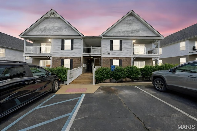 1131 Saravalle Dr, Saint Peters, MO 63376 - townhome / multi-family property featuring uncovered parking and brick siding