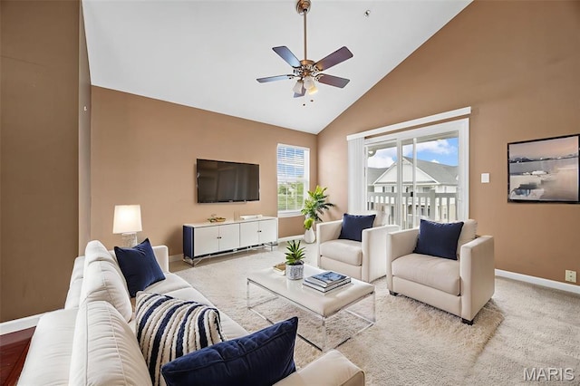 1131 Saravalle Dr, Saint Peters, MO 63376 - living room with high vaulted ceiling, ceiling fan, baseboards, and carpet flooring