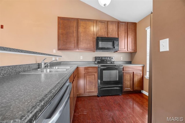 1131 Saravalle Dr, Saint Peters, MO 63376 - kitchen with black appliances, a sink, vaulted ceiling, dark wood-style floors, and brown cabinetry