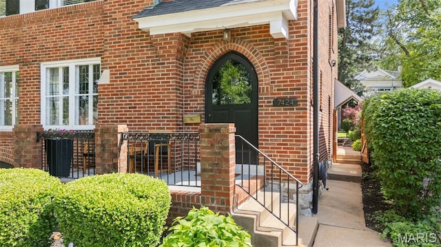 7424 University Dr, University City, MO 63130 - entrance to property featuring brick siding