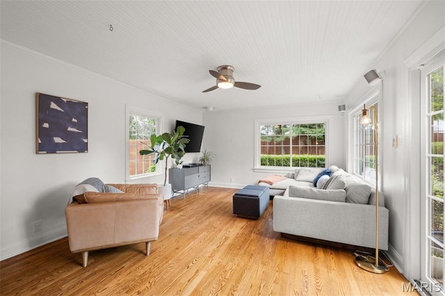 7424 University Dr, University City, MO 63130 - living room featuring light wood finished floors, baseboards, and ceiling fan