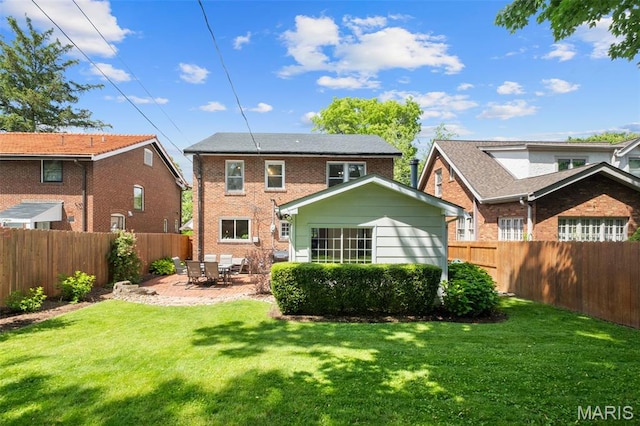 7424 University Dr, University City, MO 63130 - rear view of house featuring brick siding and a patio