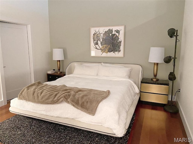 9 N Euclid Ave Unit 510, Saint Louis, MO 63108 - bedroom with wood finished floors and baseboards