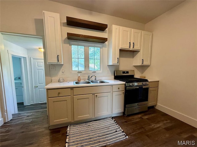 405 W Magnolia St, Marine, IL 62061 - kitchen featuring stainless steel range with gas cooktop, a sink, dark wood-style floors, light countertops, and baseboards