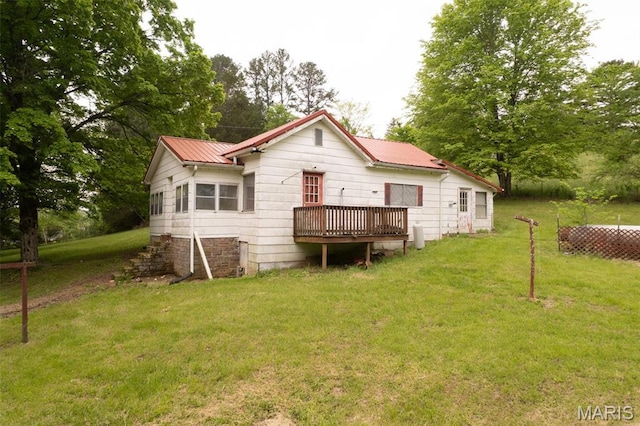 2481 Wayne 361, Piedmont, MO 63957 - rear view of house with a lawn and a metal roof