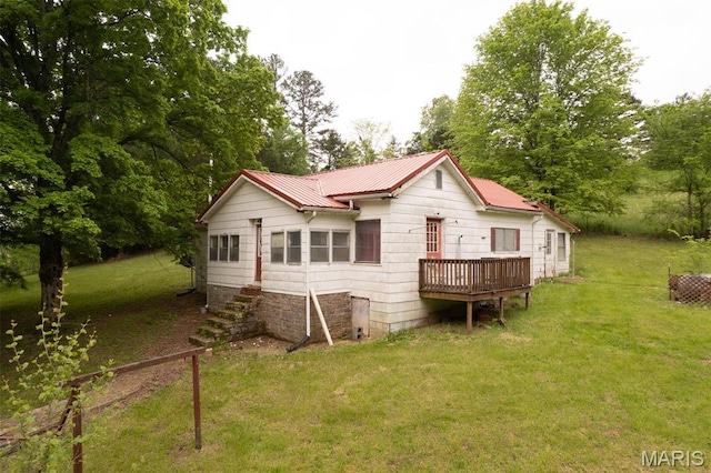 2481 Wayne 361, Piedmont, MO 63957 - back of house with a wooden deck, a lawn, and a metal roof