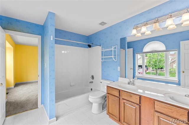 2158 Avalon Ridge Cir, Fenton, MO 63026 - full bath with wallpapered walls, bathing tub / shower combination, double vanity, tile patterned flooring, and toilet