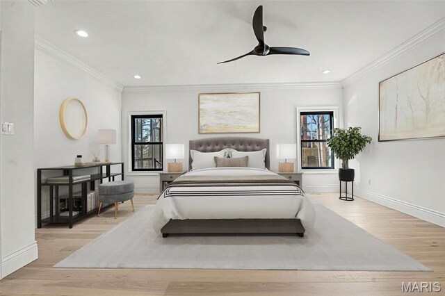 bedroom with baseboards, wood finished floors, recessed lighting, ornamental molding, and a ceiling fan