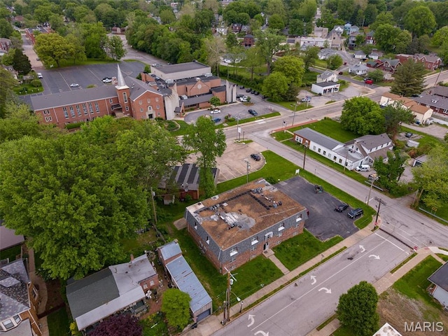 aerial overview of property's location with nearby suburban area