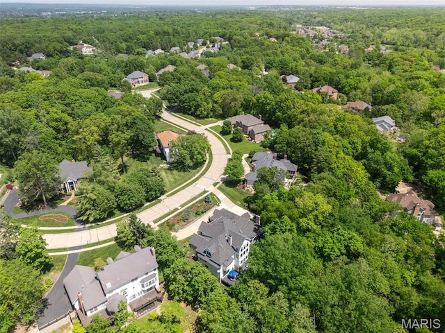 1424 Haarman Oak Dr, Wildwood, MO 63005 - aerial perspective of suburban area with a heavily wooded area